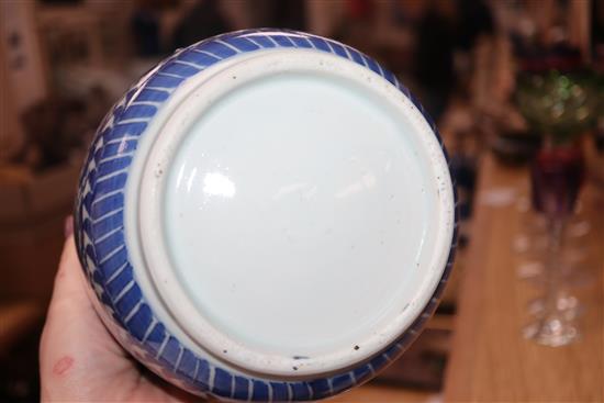 A pair of Chinese blue and white jars and covers, 19th century height 20cm